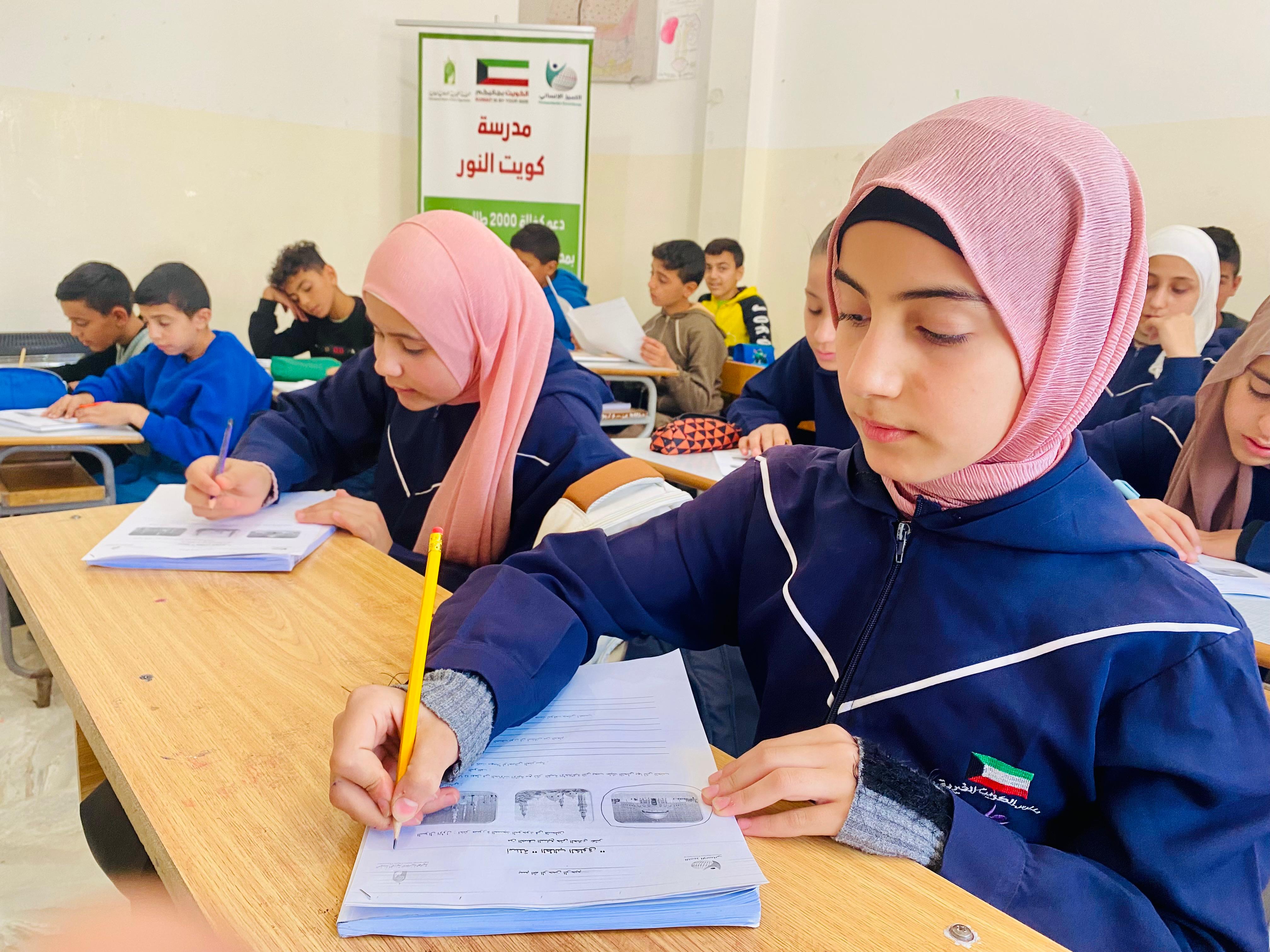 صورة لطلاب مدرسة كويت النور